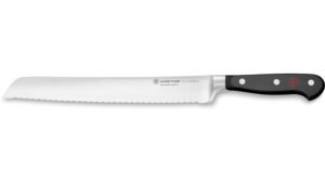 Cuchillo para cortar pan serrado con tres remaches en el mango