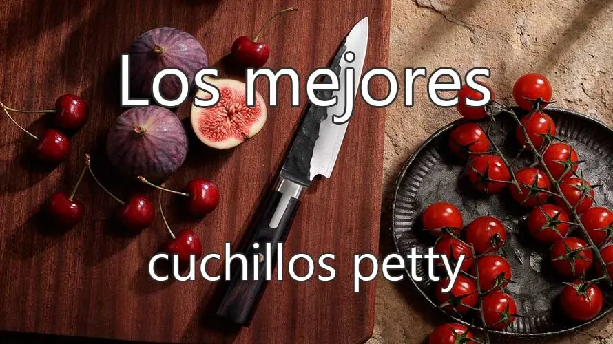 Cuchillo petty sobre tabla de corte de madera con higos y tomates a su alrededor